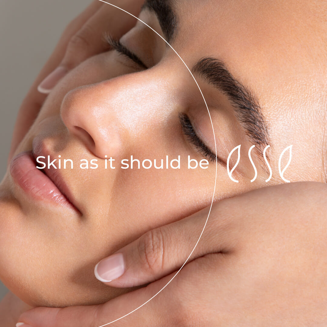 A close-up of a person receiving a gentle facial massage, eyes closed, with text overlay reading “Skin as it should be Esse.” The person's skin looks smooth and radiant.